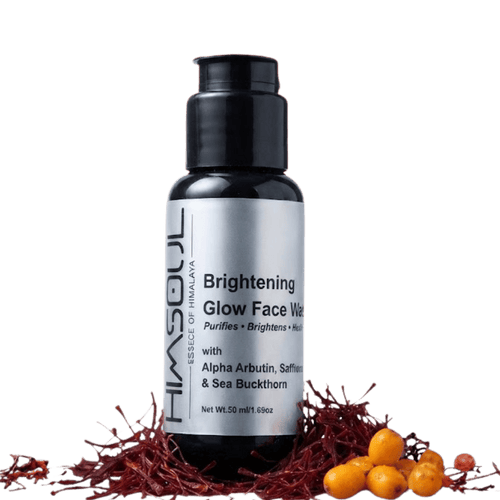 Himsoul Brightening and Glow Face Wash bottle featuring Alpha Arbutin, Saffron, and Sea Buckthorn surrounded by natural ingredients against a clean white background.